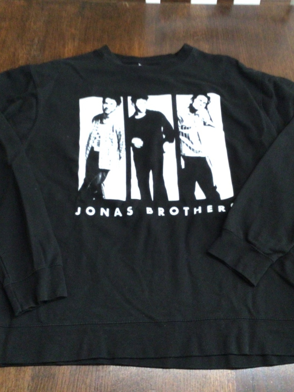 Jonas Brothers very black sweatshirt with white logo size XL. Great shape.